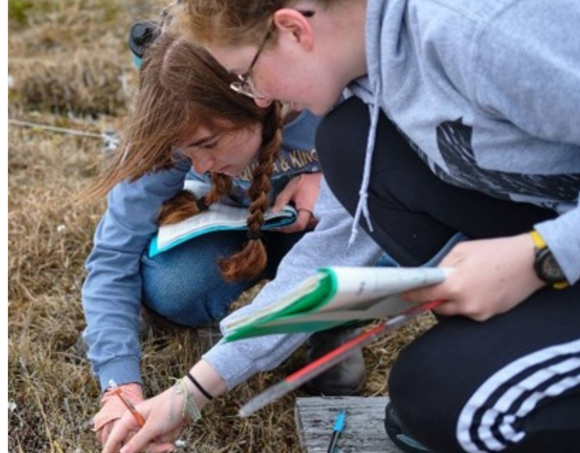 Emma and Jenna work together to conduct growth measures in Utqia&#289;vik